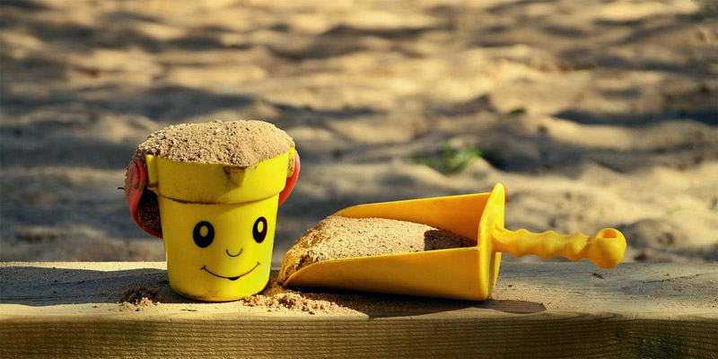 smiling bucket with shovel