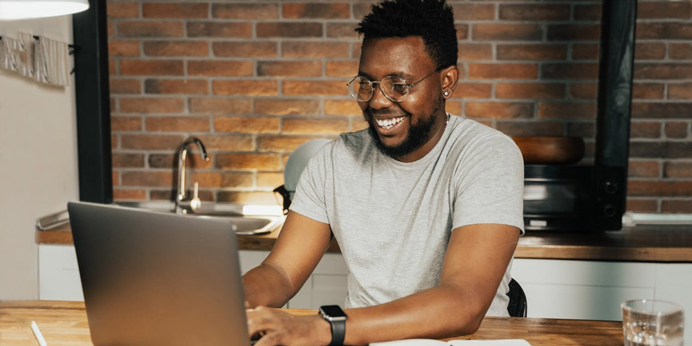 Micro task worker sitting at computer