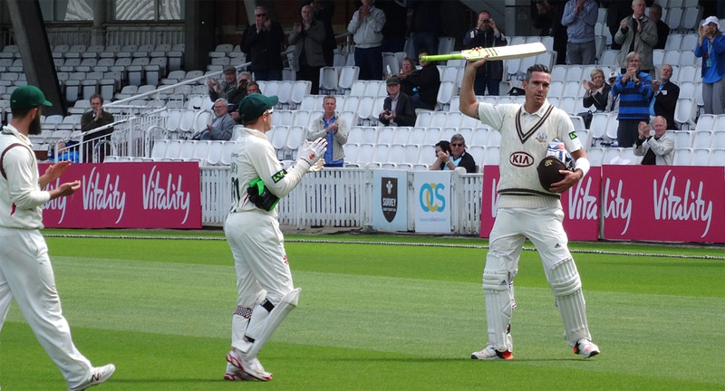 Cricket players in a stadium