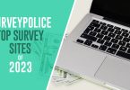 Top survey sites of 2023 text next to laptop