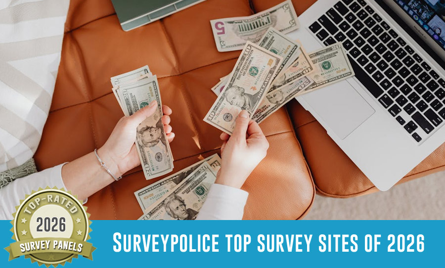 SurveyPolice Top Survey Sites of 2026. Woman with money in hand next to computer.